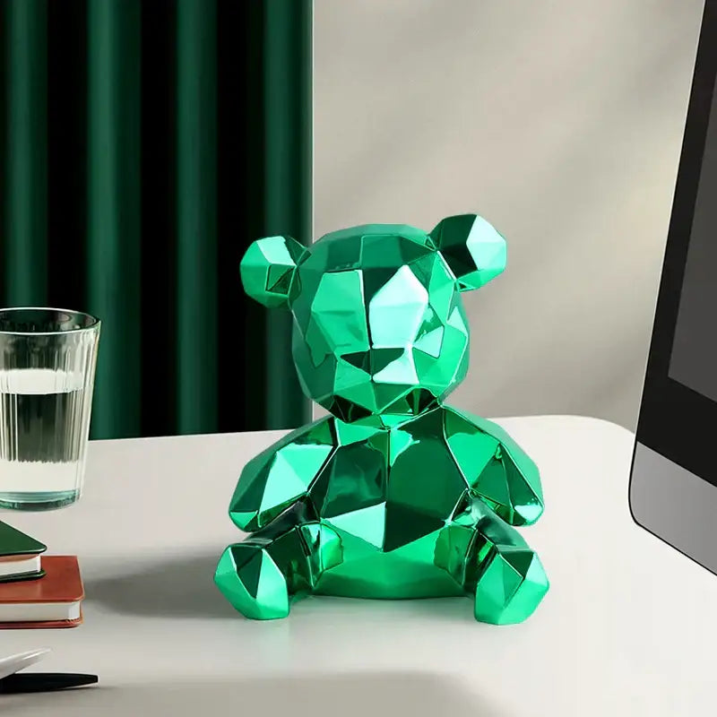 A vibrant green faceted electroplated teddy bear sculpture with a glossy geometric design for living room decor