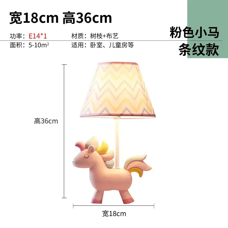 Pink unicorn table lamp with chevron-patterned shade for children’s bedroom featuring geometric pink and blue design