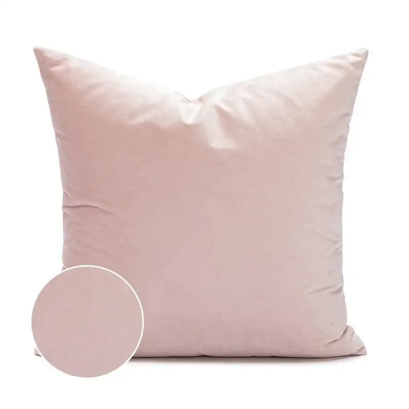 A soft blush pink cushion cover with smooth textured fabric featuring decorbites geometric embroidered design