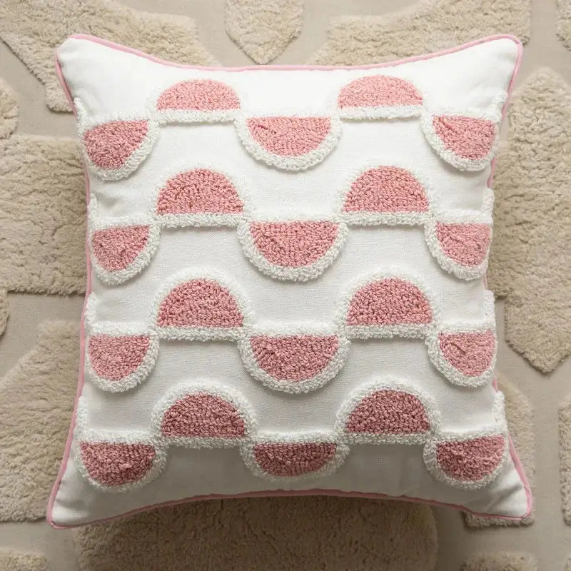 White throw pillow with textured pink half-moon pattern and piping cushion covers decorbites geometric embroidered