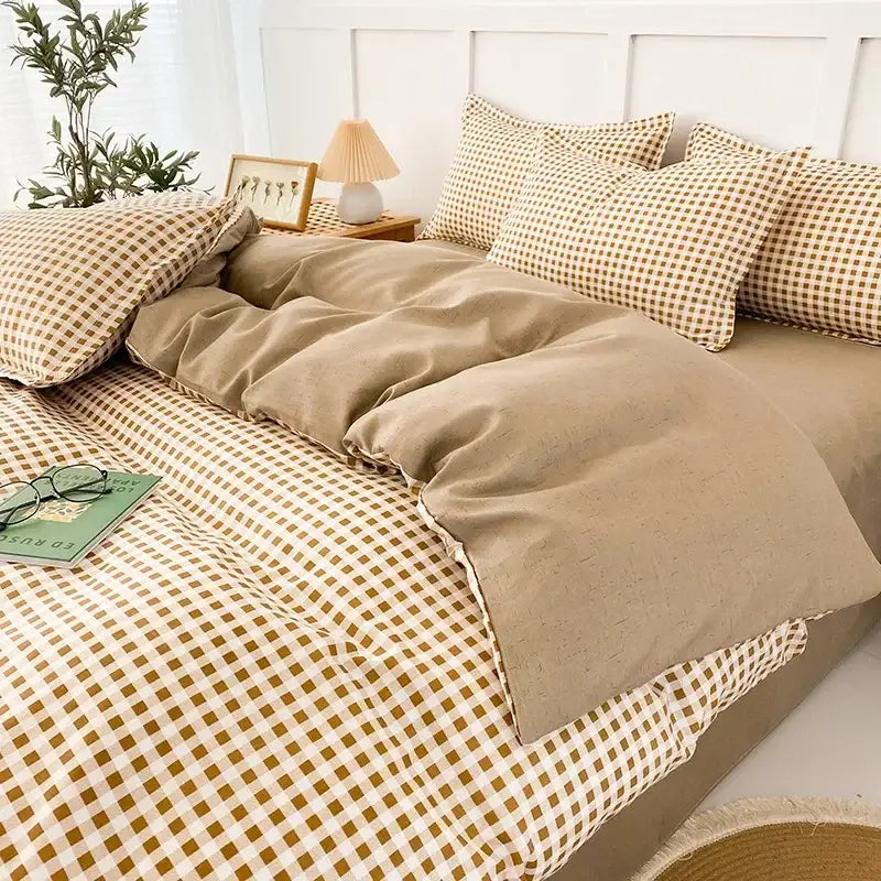 Beige and mustard yellow checkered quilt cover set with matching pillow sham for geometric pink and white gingham bedroom