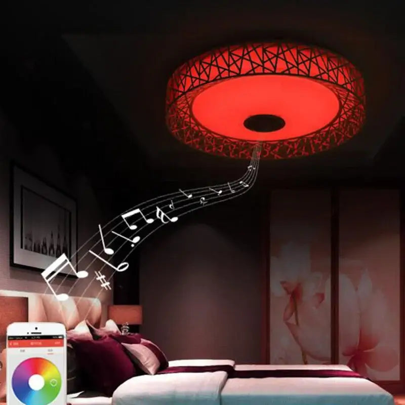 Red circular ceiling light with geometric lattice design featuring decorbites bluetooth speaker for bedroom use
