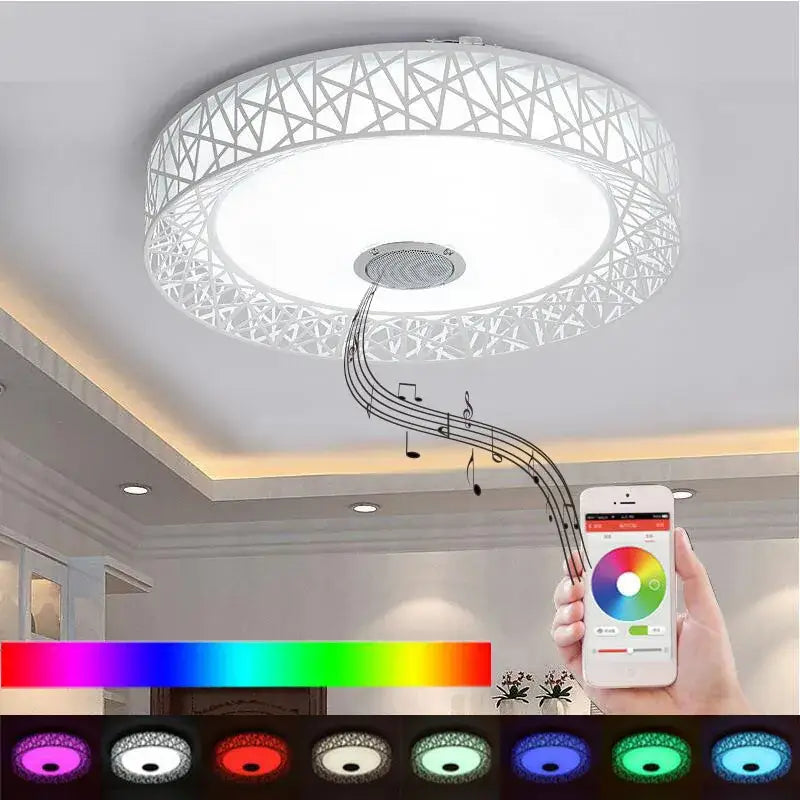 White circular ceiling light with geometric lattice design and integrated decorbites bluetooth speaker and color-changing led