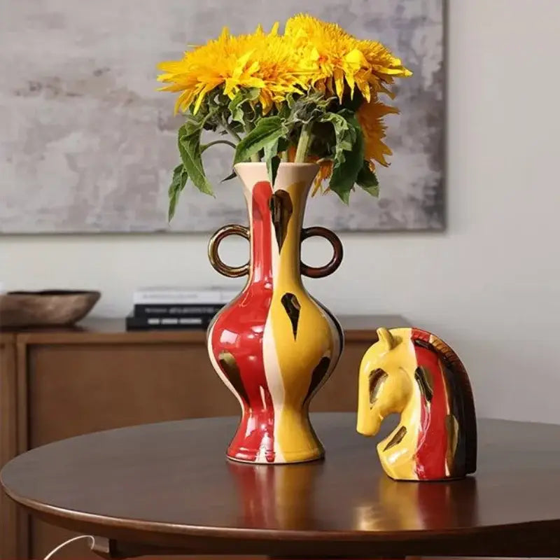 Vibrant red and yellow geometric horse head ceramic vase with dual handles and glossy glaze for living room decor