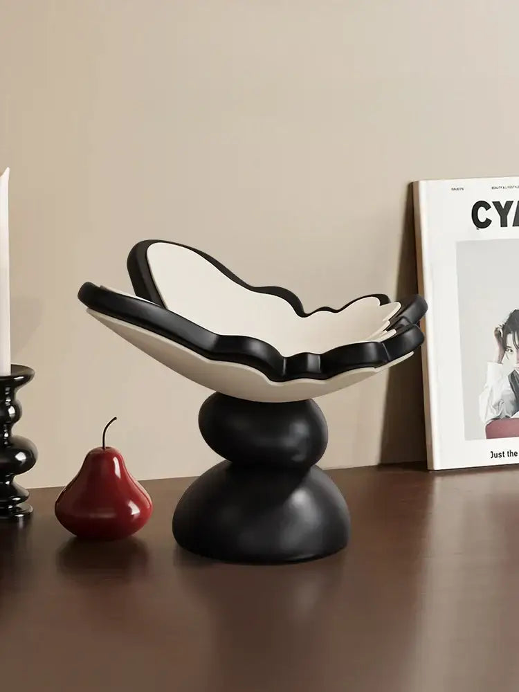 Black and white ceramic butterfly geometric resin bowl with layered petal design for dining room storage tray