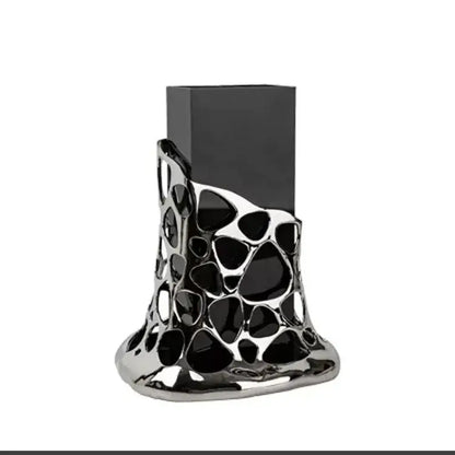 Black rectangular glass vase with geometric acrylic silver base and intricate organic cutouts for living room decorbites decor