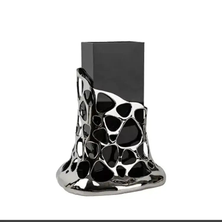 Black rectangular glass vase with geometric acrylic silver base and intricate organic cutouts for living room decorbites decor