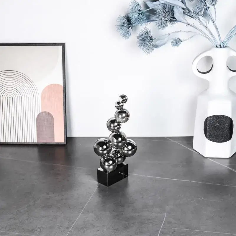 Shiny geometric crystal sculpture silver with blue crystal spheres on black base for living room decor