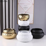 Stacked ceramic vase in gold white and black with textured geometric patterns ideal for minimalist living room decorbites decor