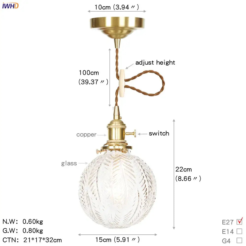 A vintage-style brass pendant light with clear etched glass globe and adjustable height cord for kitchen use copper led pendant