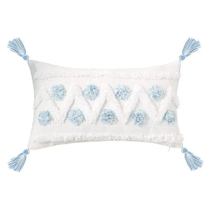 White rectangular pillow cover with light blue geometric tassel tufted pom-poms and tassels for living room decor