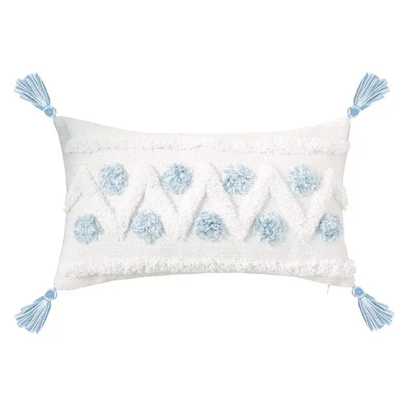 White rectangular pillow cover with light blue geometric tassel tufted pom-poms and tassels for living room decor