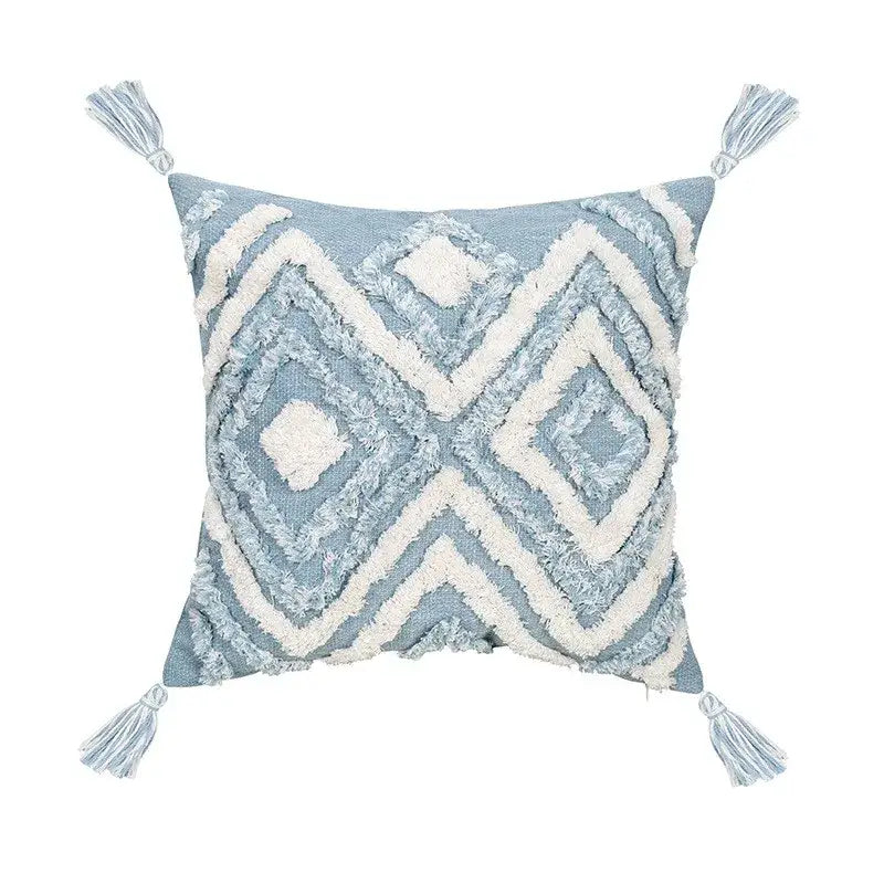 Light blue and white geometric tassel tufted pillow covers with textured star pattern and tassels for living room decor