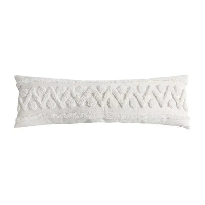 White textured lumbar pillow cover with woven geometric tassel tufted pattern and frayed edges for living room decor