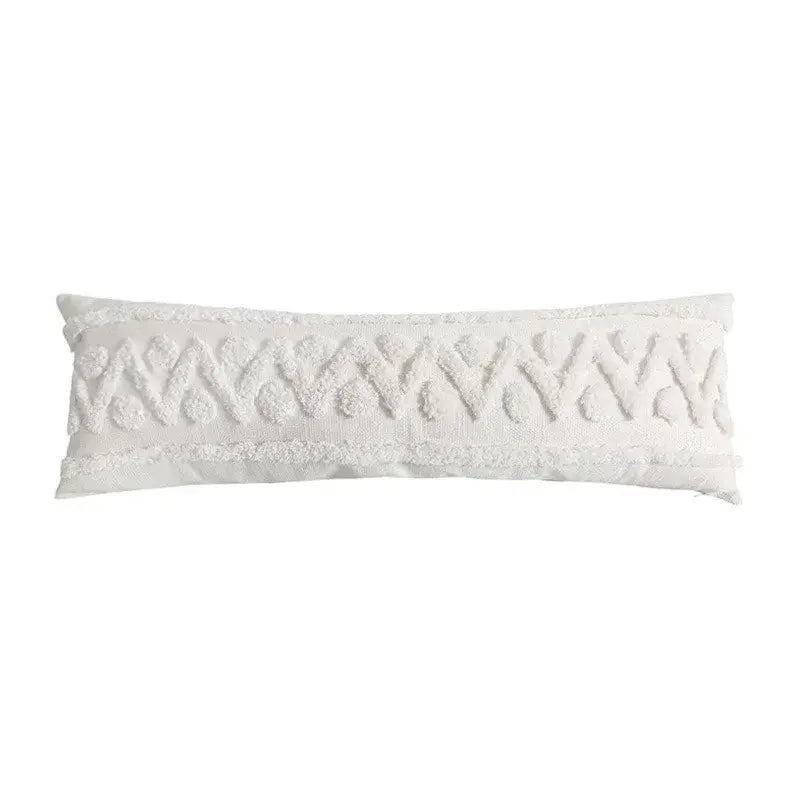 White textured lumbar pillow cover with woven geometric tassel tufted pattern and frayed edges for living room decor