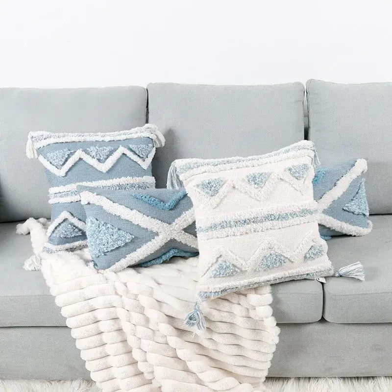 Blue and white textured pillow covers with geometric tassel tufted patterns and star design for living room decor