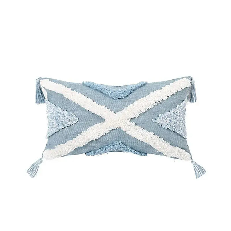 Light blue and white geometric tassel tufted pillow cover with woven cross pattern and corner tassels for living room decor
