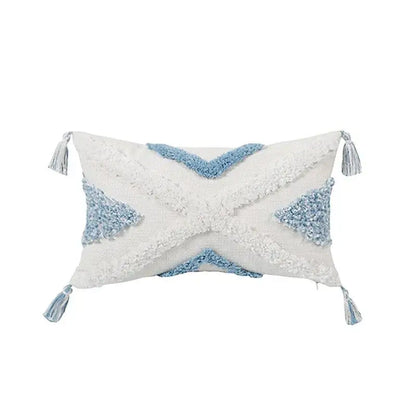 Rectangular white and light blue geometric tassel tufted pillow covers with woven star pattern and tassels for living room decor