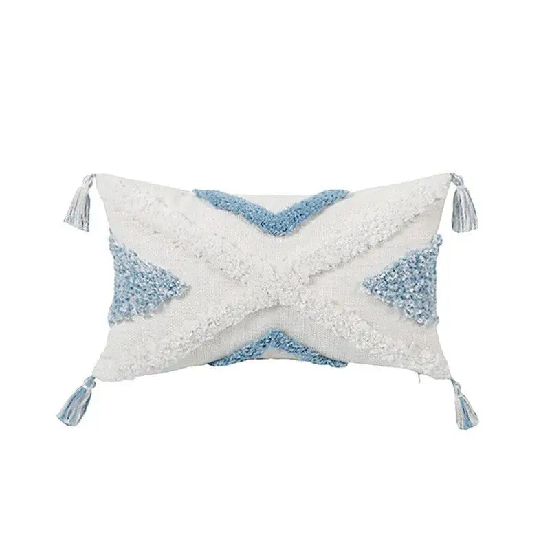 Rectangular white and light blue geometric tassel tufted pillow covers with woven star pattern and tassels for living room decor