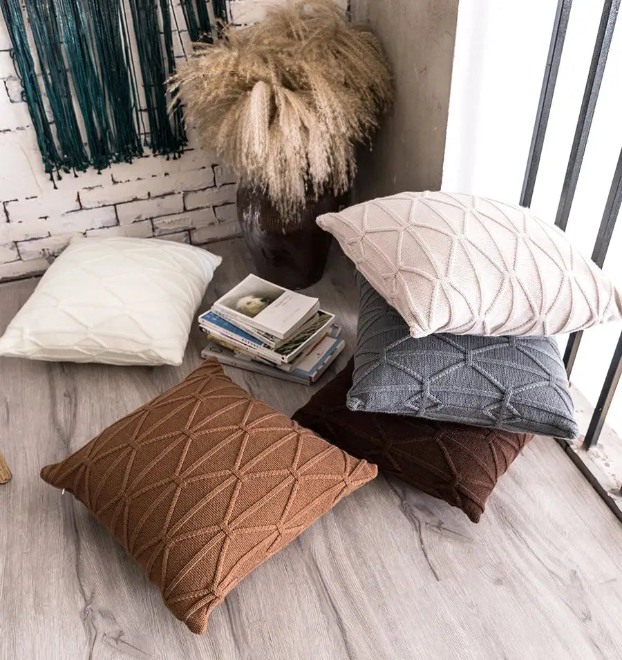 A set of earthy tone geometric textured knit cushion covers with soft fabric finish for living room decorbites decor