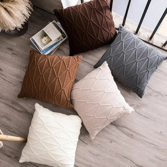 Set of five earthy toned square decorbites knit cushion covers with textured geometric pattern for living room decor