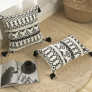 Black and white geometric tufted cotton cushion cover with fringed edges and tassels for living room decorbites decor