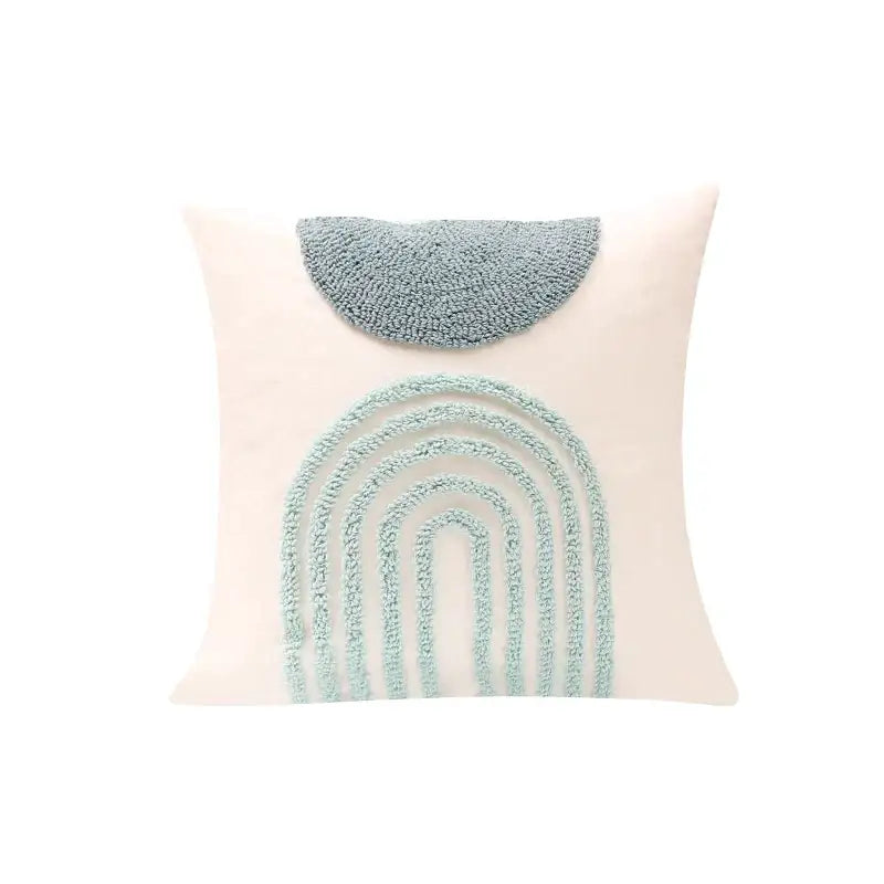 A cream pillow cover with a light blue plush geometric tufted diamond and half-circle design for decorbites decor
