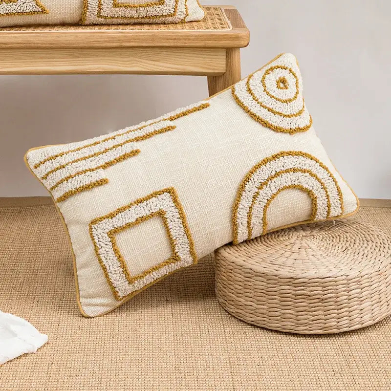 Cream-colored cushion cover with textured gold and off-white embroidered geometric tufted fringed pattern for living room decorbites geometric tufted style