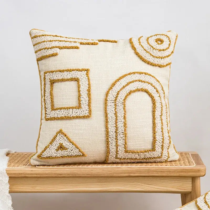 Cream-colored cushion cover with mustard yellow geometric tufted plush embroidery for decorbites living room decor