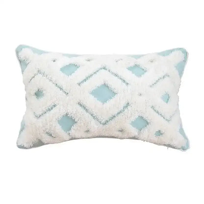 A rectangular beige and gray cushion cover with geometric tufted tassel design and white fluffy fringe for living room decor