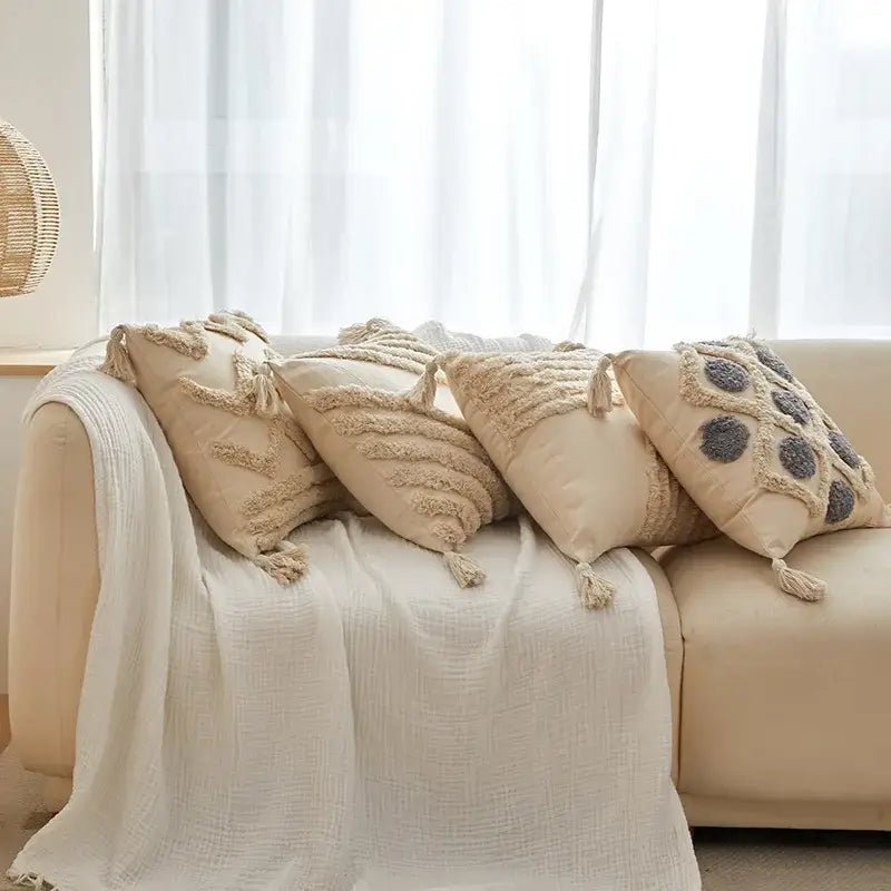 Beige and gray geometric tufted tassel cushion cover with textured tassel-trimmed embroidery for living room decor
