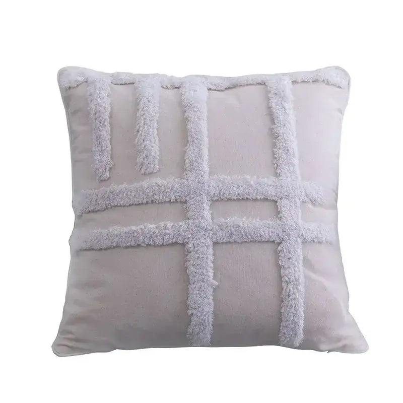A soft light gray geometric tufted tassel cushion cover with a textured fluffy white grid pattern for living room decor