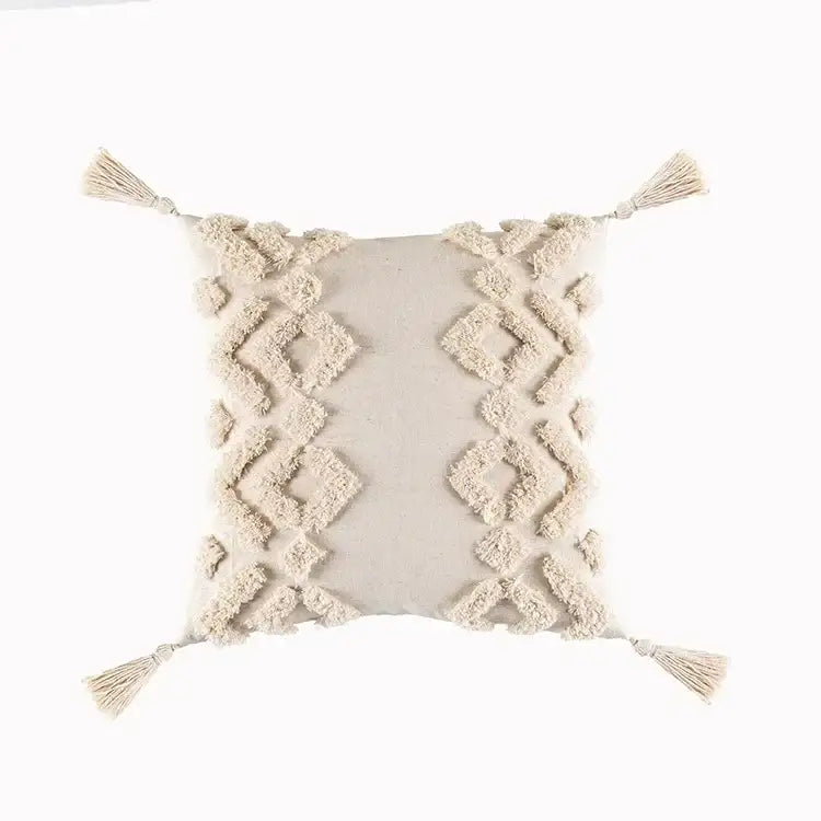 Cream-colored geometric tufted tassel cushion cover with textured diamond-patterned tassels and fringe accents for living room decor