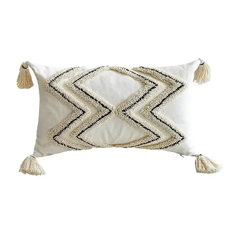 Cream-colored geometric tufted tassel cushion cover with black embroidery and tassels for beige and gray living room decor