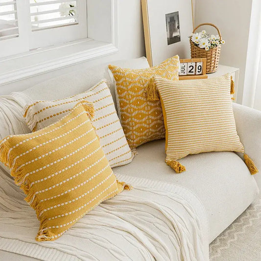 Yellow geometric tufted cushion cover with textured fabric and crochet tassels for living room decorbites decor