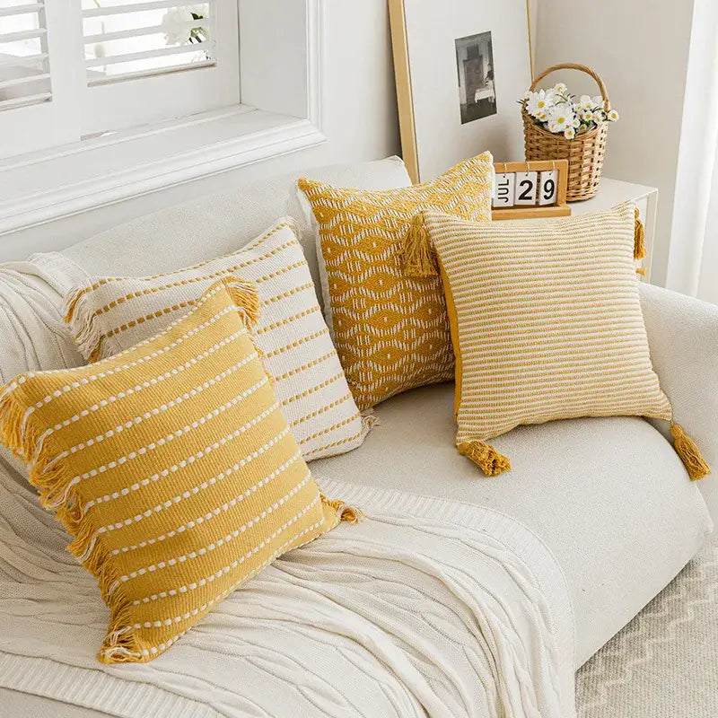 Yellow geometric tufted cushion cover with textured fabric and crochet tassels for living room decorbites decor