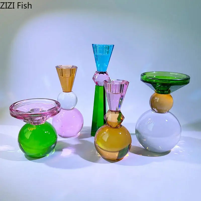 Vibrant geometric crystal candle holders in translucent green pink amber and blue faceted glass for dining room use
