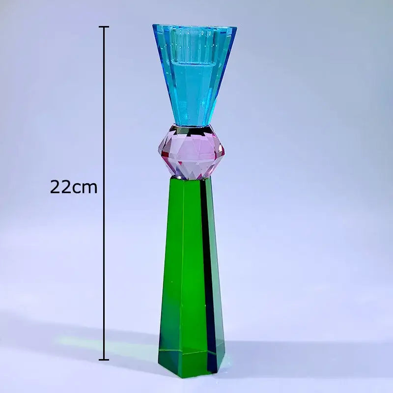 A vibrant 22cm crystal candle holder with a blue conical top, pink faceted gemstone middle, and green hexagonal base