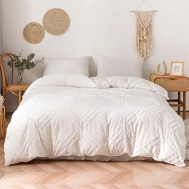 White textured quilted duvet cover set with geometric embroidery pattern for bedroom bedding use