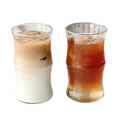 Two clear glass bamboo knot mugs with bamboo-inspired design filled with iced coffee and iced tea for kitchen use