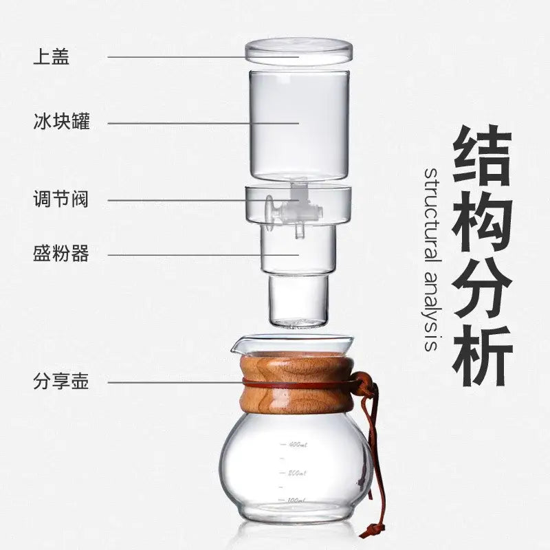 Clear glass cold brew coffee maker with wooden lid and brown leather strap for brew coffee in kitchen