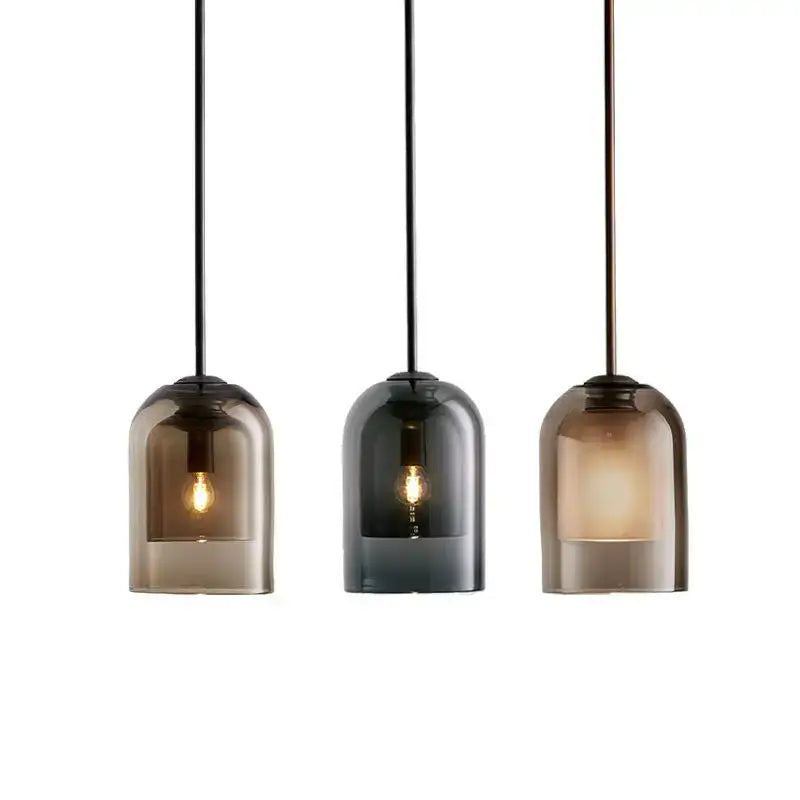 Three light glass led chandelier with smoked glass shades and black cords for dining room lighting