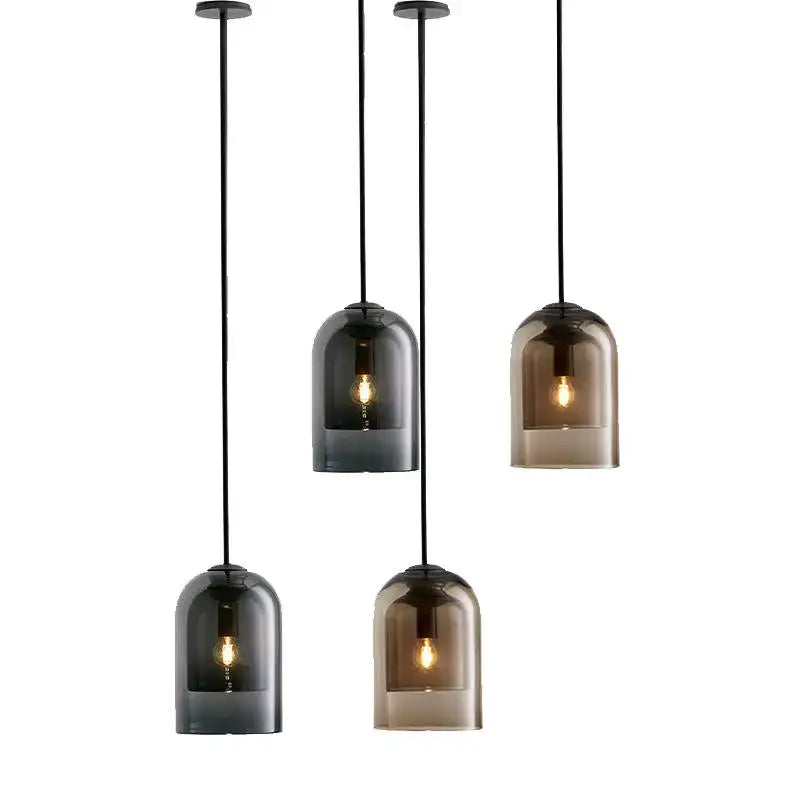 Set of four modern glass led chandelier pendant lights with smoked glass bell shades and black cords for dining room