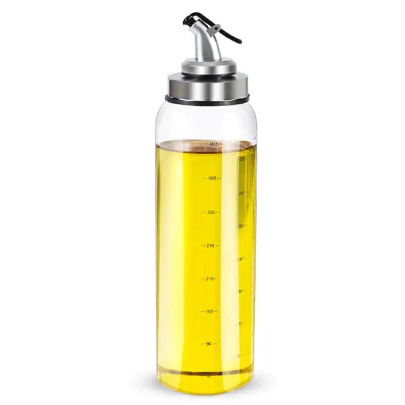 Clear glass seasoning dispenser bottle filled with golden oil with stainless silver spout and black lever for kitchen use