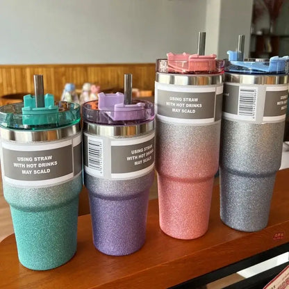 Glitter pink blue and teal stainless steel double wall insulated water bottle with metallic lids and straws in teal purple rose gold and silver
