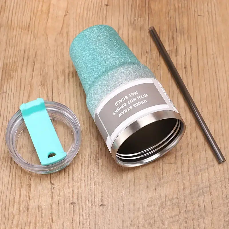 Glitter pink blue and teal stainless steel double wall insulated water bottle with clear lid and turquoise handle