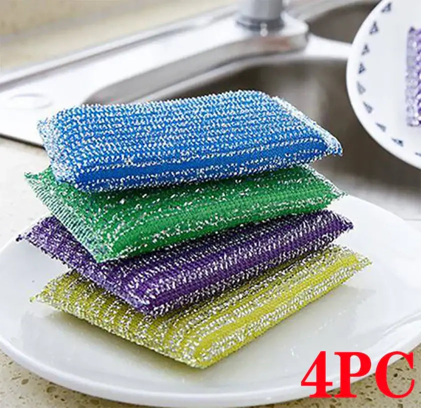 Stacked colorful stainless steel scrubbers in blue green purple and yellow from decorbites kitchen cleaning set