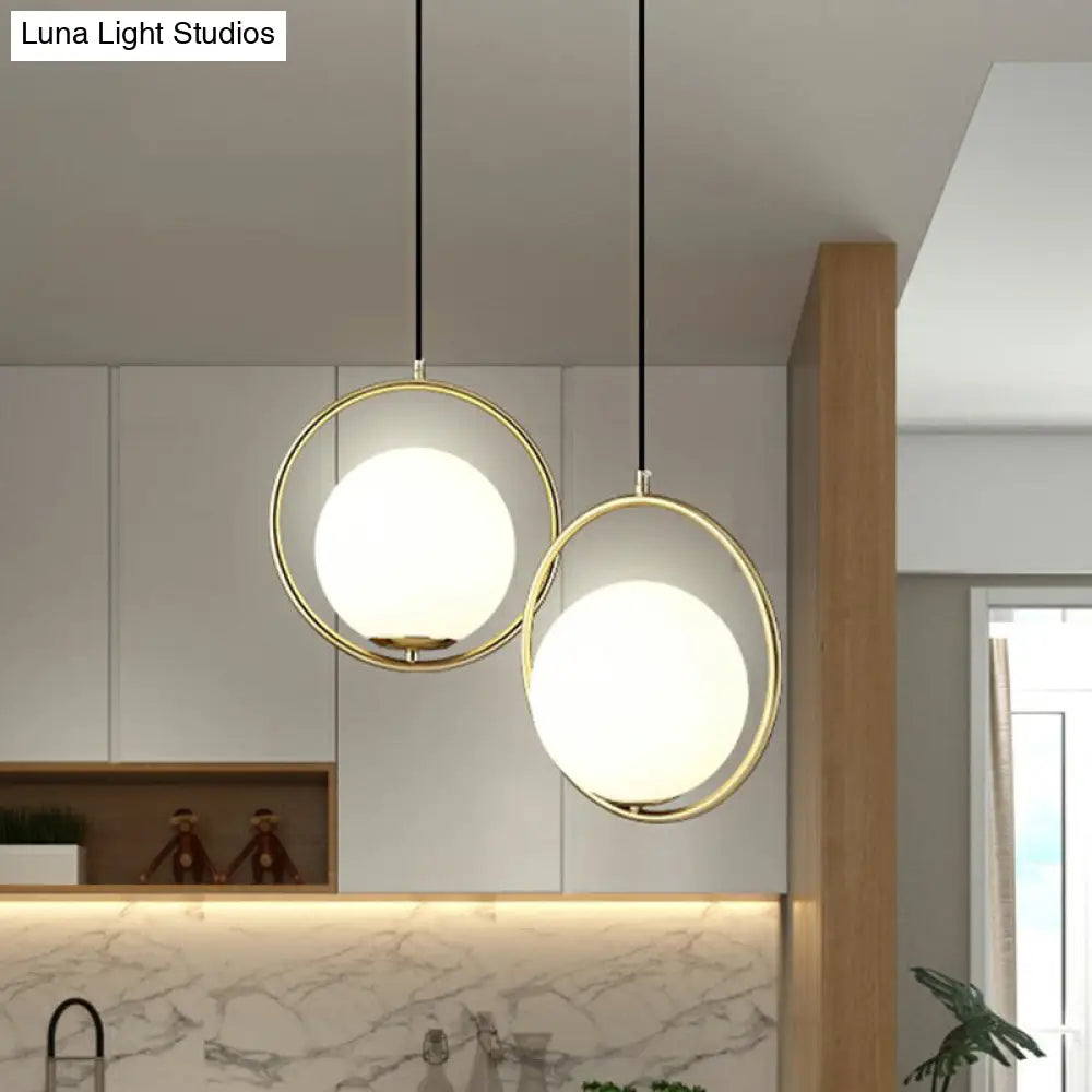 Globe Milky Glass 1-Bulb Pendant Light with Brass Loop – Modern Dining Room Suspension Lamp