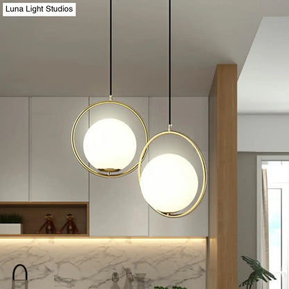 Globe Milky Glass 1-Bulb Pendant Light with Brass Loop – Modern Dining Room Suspension Lamp