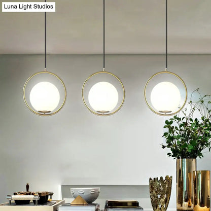 Globe Milky Glass 1-Bulb Pendant Light with Brass Loop – Modern Dining Room Suspension Lamp